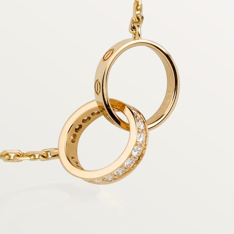 Cartier LOVE pendant, half-paved