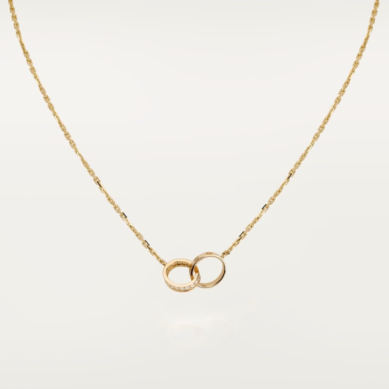 Cartier LOVE pendant, half-paved